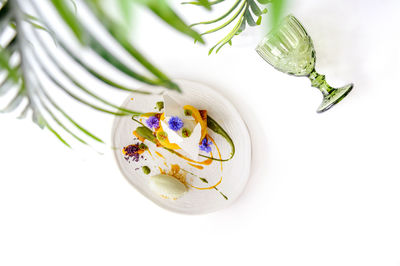 Close-up of christmas decorations on white background