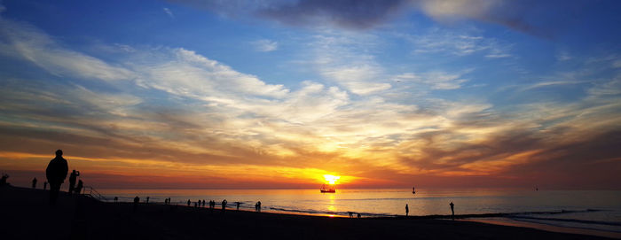 Scenic view of sea at sunset