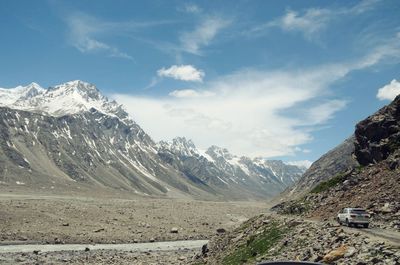 Car on road against mountains