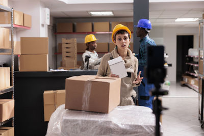 Side view of man working in workshop