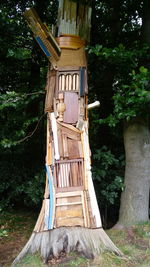 Low angle view of built structure against trees