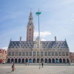 Group of people in front of historical building