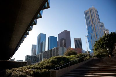Low angle view of skyscrapers against sky