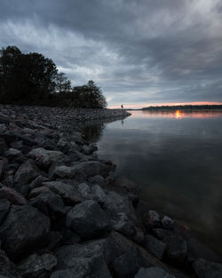 Scenic view of sea against sky at sunset