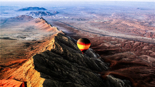High angle view of hot air balloon on rock