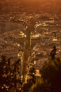 High angle view of illuminated buildings in city at night