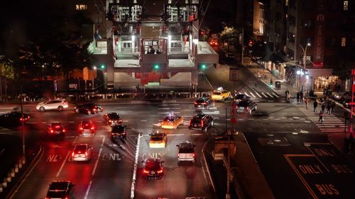 Traffic on city street at night