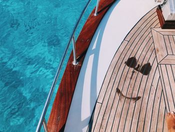 High angle view of  the sea with the mark of a bikini on the boat