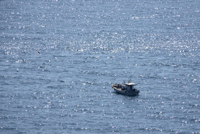 Boat sailing in sea