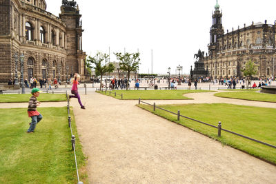 Tourists in front of historic building