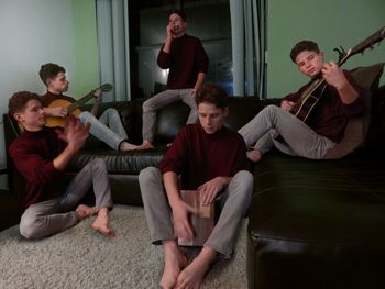 Musicians practicing musical instruments at home