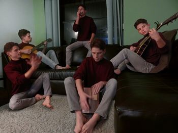 Musicians practicing musical instruments at home