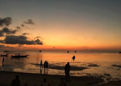 Scenic view of sea at sunset