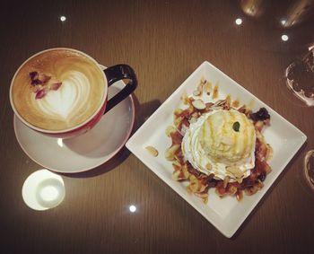 Close-up of coffee served on table