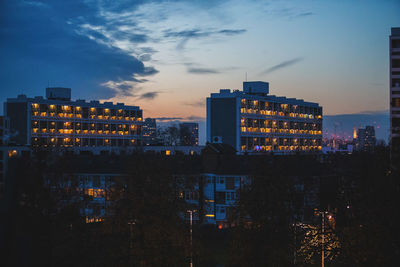 Illuminated buildings in city at night