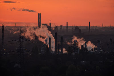 Cityscape against sky during sunset