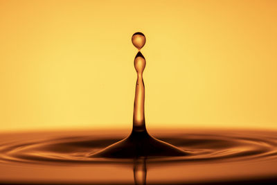 Close-up of drop splashing in water