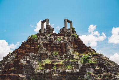 Low angle view of old building against sky