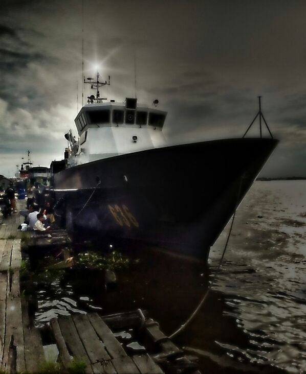 water, nautical vessel, transportation, mode of transport, boat, sky, moored, sea, cloud - sky, travel, pier, outdoors, reflection, rippled, waterfront, nature, dusk, cloudy, cloud, sunset