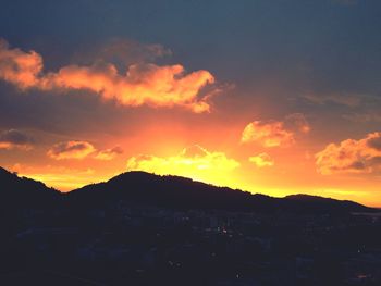 Scenic view of mountains at sunset