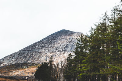 Low angle view of mountain against clear sky