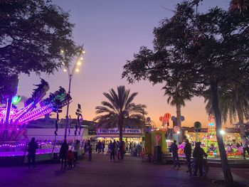 Group of people in city at night