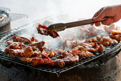 Close-up of meat on barbecue grill