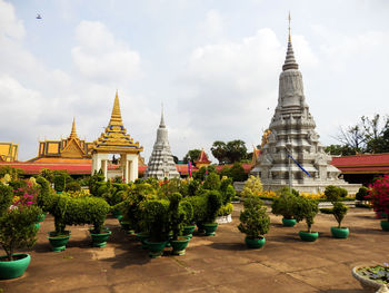 View of temple against building
