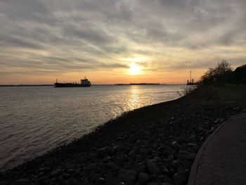 Scenic view of sea against sky during sunset