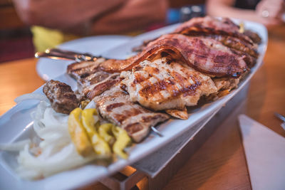 Close-up of meat in plate on table