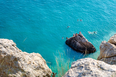 High angle view of rock formation in sea