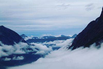 View of mountain range against cloudy sky