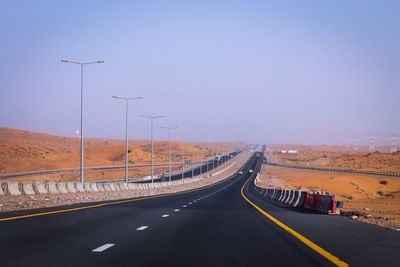 Road against clear sky