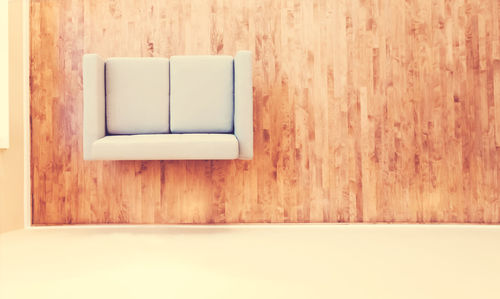 Wooden table against wall at home