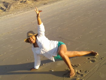 Young man on sand at beach