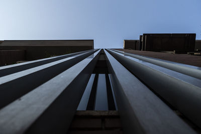 Low angle view of skyscraper against clear sky