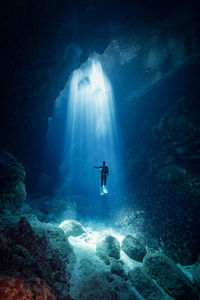 Person swimming in sea