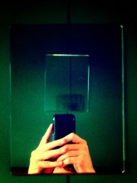 Young woman holding smart phone