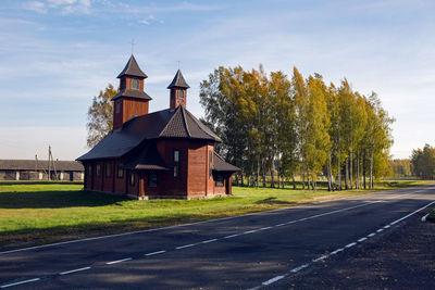 Old log church in russia in autumn