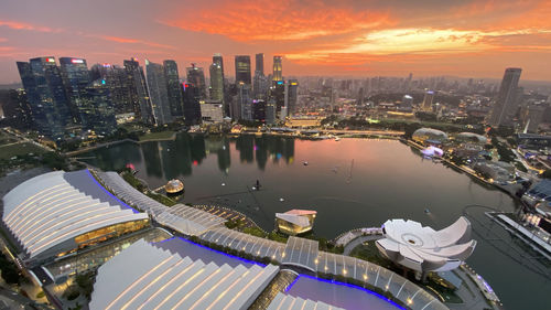 High angle view of buildings against sky during sunset