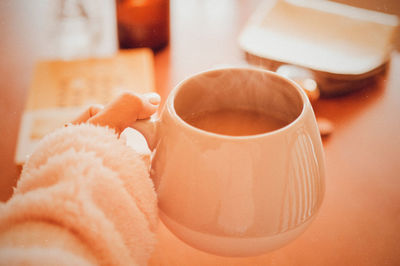 Close-up of coffee cup on table