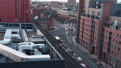 High angle view of street amidst buildings in city