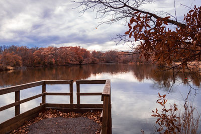 Scenic view of lake against sky during autumn