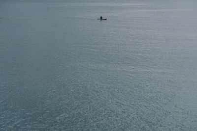 High angle view of boat sailing in sea