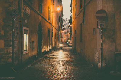 Narrow pathway along built structures