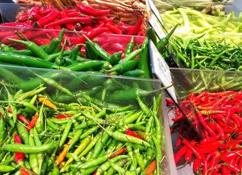 High angle view of red chili peppers for sale at market stall