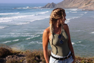 Woman standing at beach