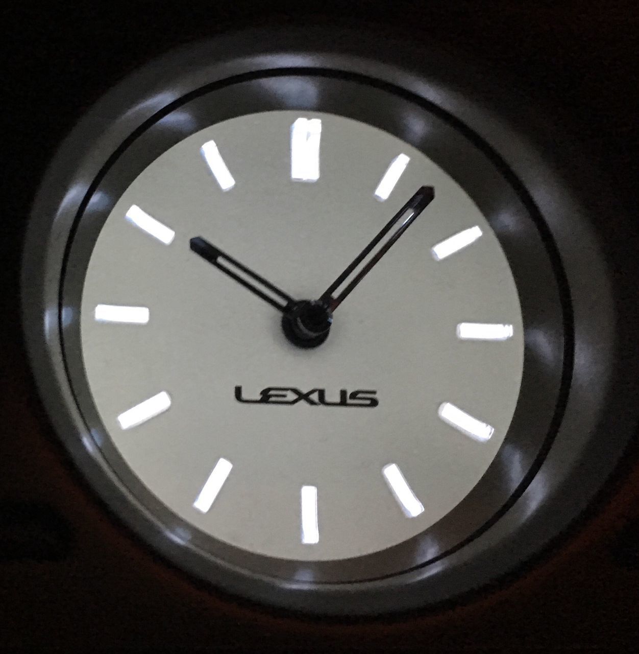 CLOSE-UP OF TEXT ON WALL CLOCK