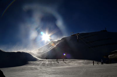 Sun shining over landscape