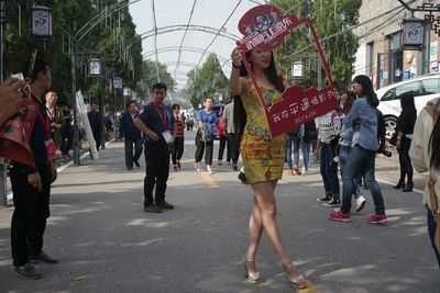 People on street in city